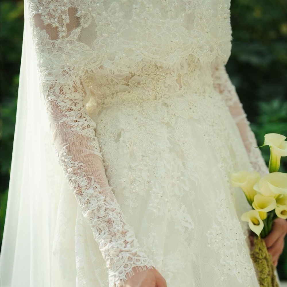 Customized lace overlay embellished wedding dress